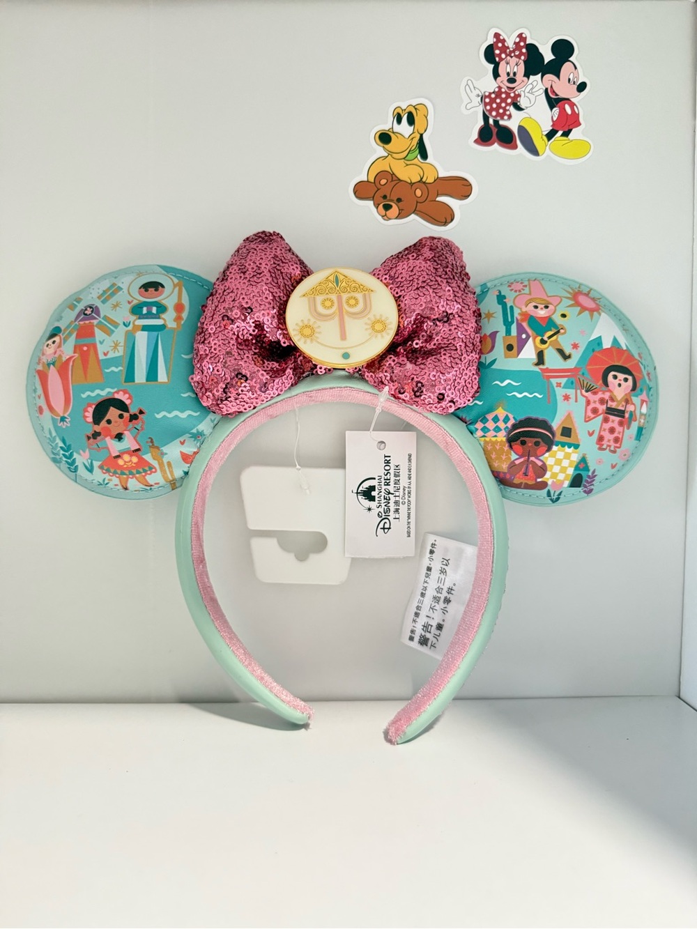 Disney It’s A Small World Sequin Bow Ear Headband - Pink & Aqua Patterned Ears